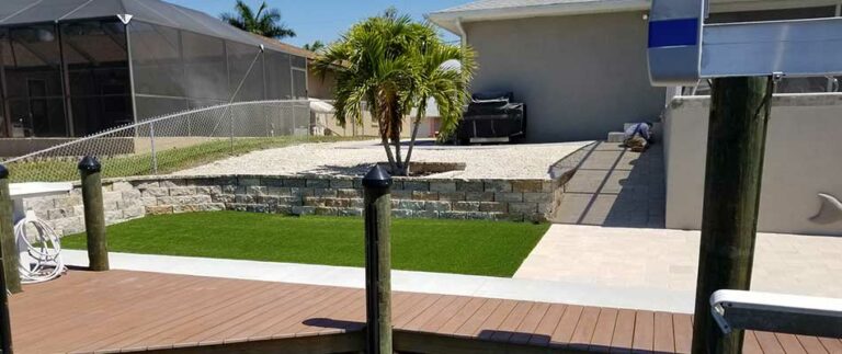 New Landscape Bed & Artificial Turf at Palmetto, FL Waterfront Property
