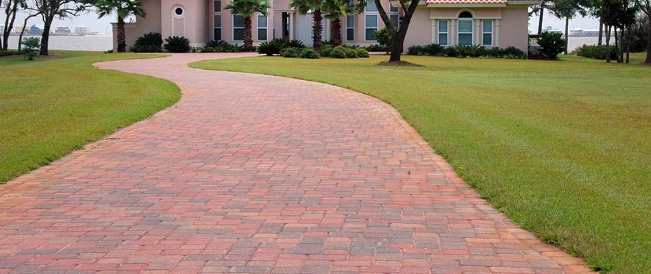 Custom paver driveway installation at a home in Palmetto, FL.