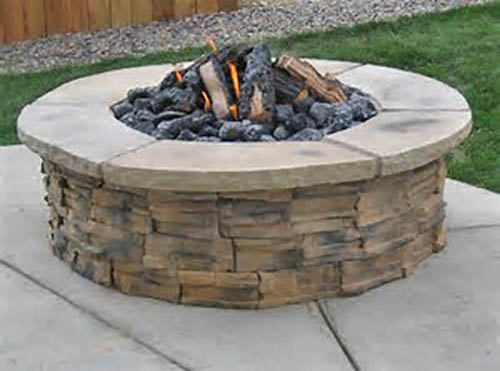 Custom fire pit built by Three Seasons at home in Palmetto, FL.