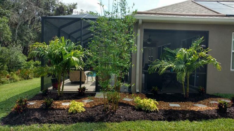 Create privacy with landscaping and stop erosion around pool home in Palmetto, FL.